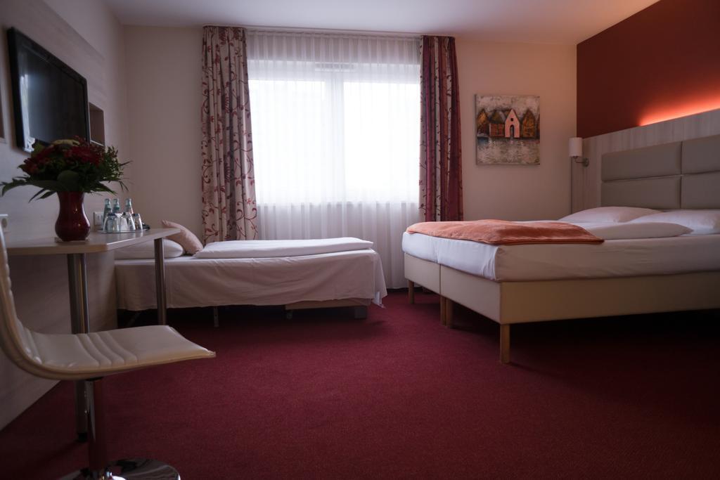 Hotel Roedelheimer Hof - Am Wasserturm Франкфурт-на-Майні Номер фото