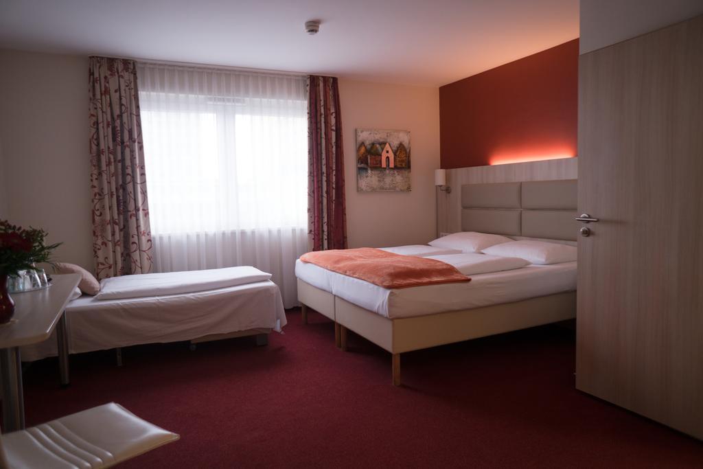 Hotel Roedelheimer Hof - Am Wasserturm Франкфурт-на-Майні Номер фото
